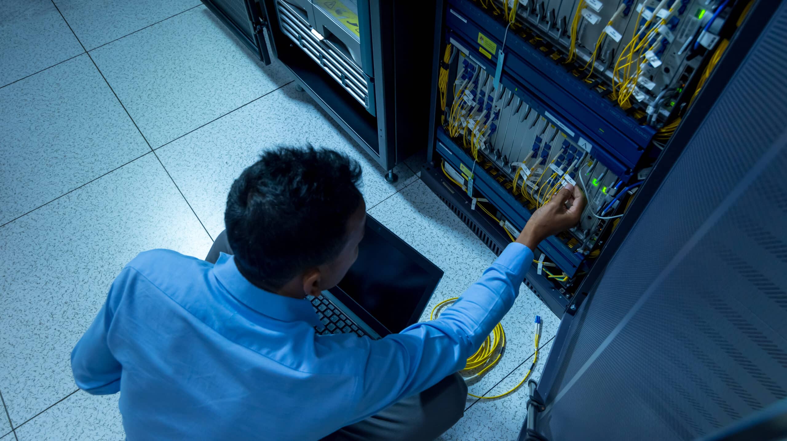 Network,Administrator,Working,In,Data,Center,Room